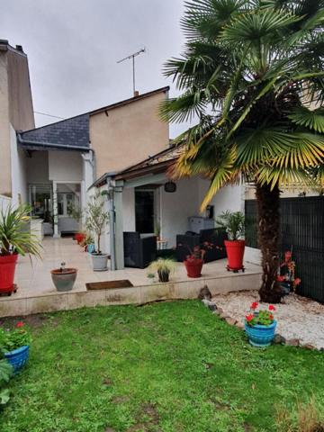 Maison de ville  4 pièce(s) 93 m2 , 3 chbres et jardin