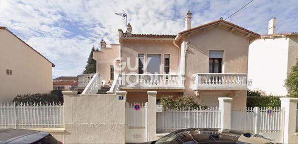 Maison de charme avec jardin et grand garage au calme.