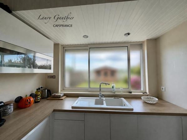Maison familiale de 98 m² à Comines – 4 PIÈCES  Un lieu où il fait bon vivre