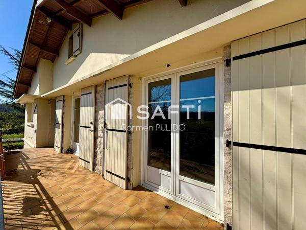 Spacieuse maison en campagne : 4 chambres, jardin arboré, garage et dépendances