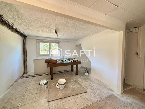 Spacieuse maison en campagne : 4 chambres, jardin arboré, garage et dépendances