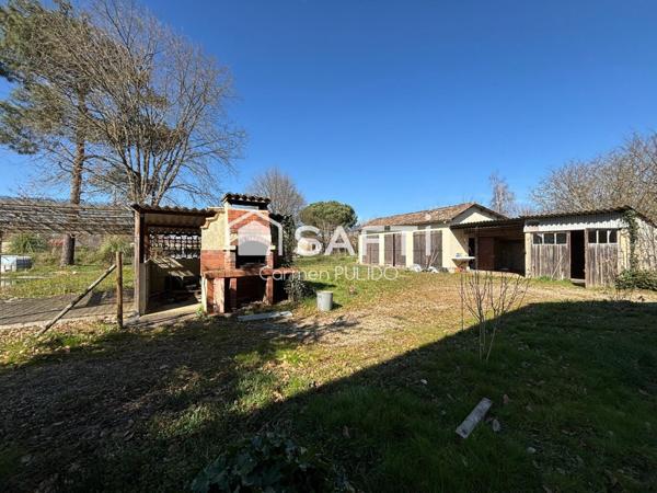 Spacieuse maison en campagne : 4 chambres, jardin arboré, garage et dépendances