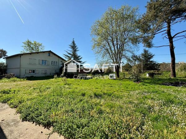 Spacieuse maison en campagne : 4 chambres, jardin arboré, garage et dépendances
