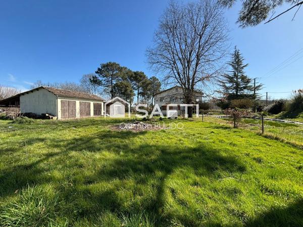 Spacieuse maison en campagne : 4 chambres, jardin arboré, garage et dépendances