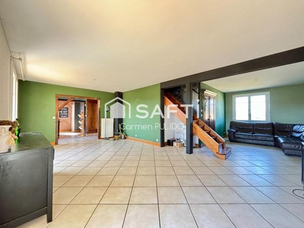 Spacieuse maison en campagne : 4 chambres, jardin arboré, garage et dépendances