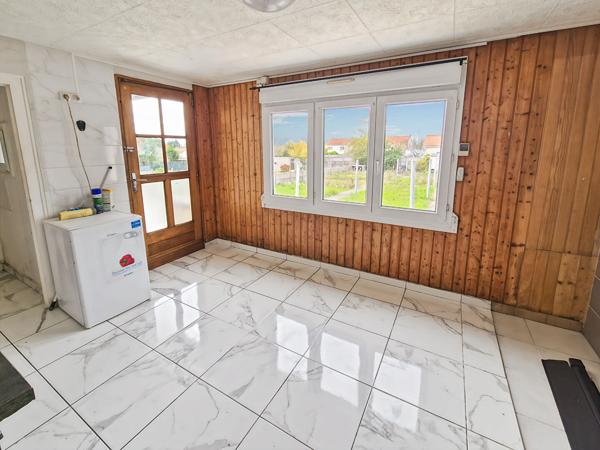 Maison 4 chambres + garage et jardin