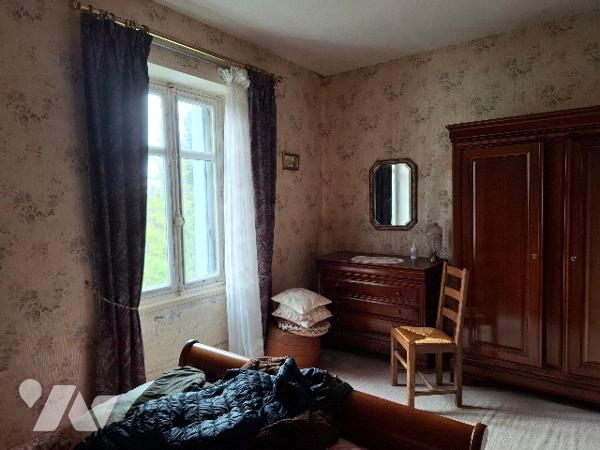 MAISON DE BOURG avec garage et jardin