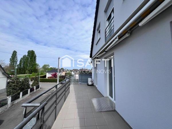 Très jolie appartement 2 pièces d'une superficie de 53m² avec garage et belle terrasse de 18m² situé à village neuf