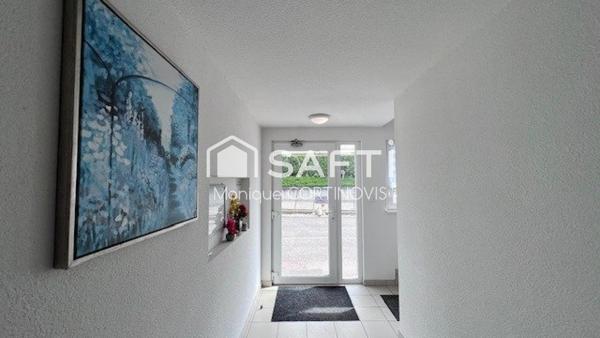 Très jolie appartement 2 pièces d'une superficie de 53m² avec garage et belle terrasse de 18m² situé à village neuf