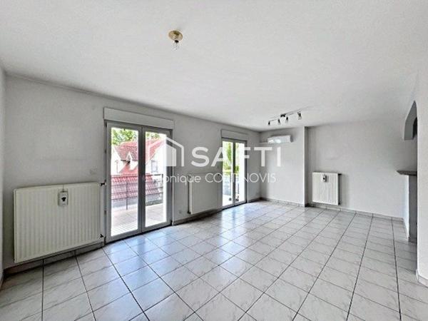 Très jolie appartement 2 pièces d'une superficie de 53m² avec garage et belle terrasse de 18m² situé à village neuf