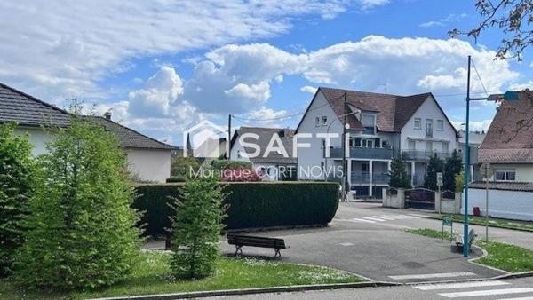 Très jolie appartement 2 pièces d'une superficie de 53m² avec garage et belle terrasse de 18m² situé à village neuf