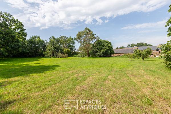 Domaine en pierres dans voie privée à ST BRIEUC et 10 000 m2 de jardin dont constructible en partie.