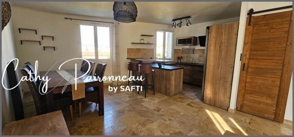 Bel espace de vie et lumineux