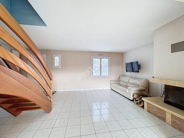 Maison spacieuse à vendre à Les Sorinières - 6 chambres et jardin !