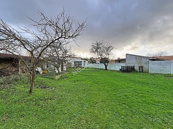 Maison spacieuse à vendre à Les Sorinières - 6 chambres et jardin !