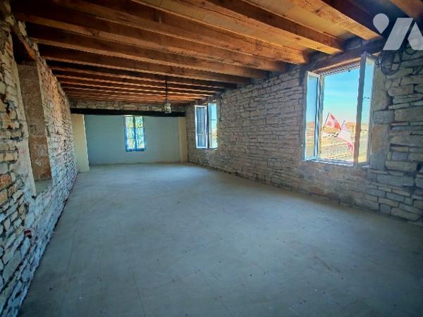 Spécial investisseur ! venez découvrir ce bel immeuble avec sa magnifique vue sur la Saône !