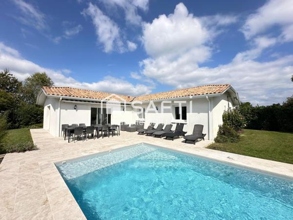 Maison 4 chambres avec piscine et garage