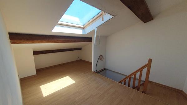 Quartier calme : Maison de ville avec garage !