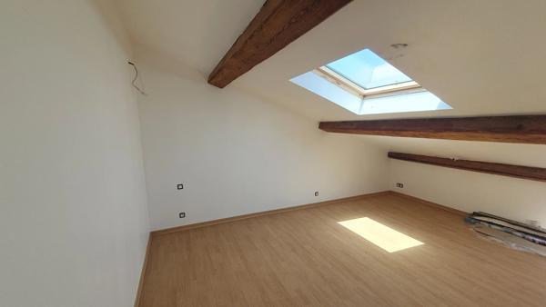 Quartier calme : Maison de ville avec garage !