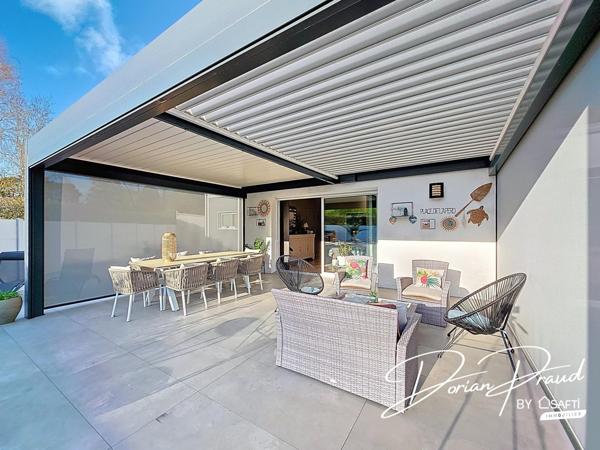 Maison de plain-pied de 193 m² avec grand terrain et garages