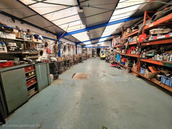 Habitation avec grand garage et fort potentiel