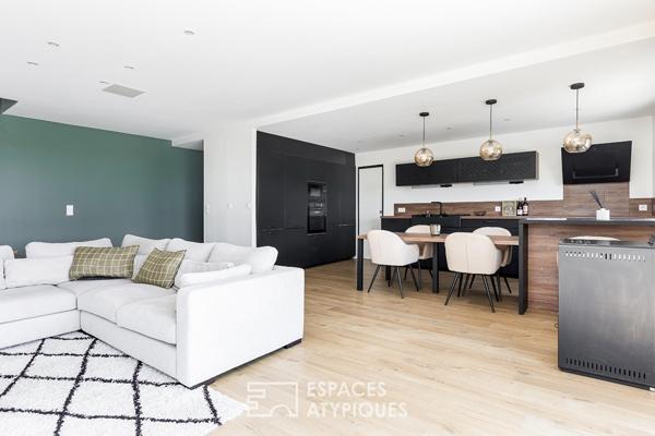 Maison contemporaine avec piscine et vue dégagée à Merville