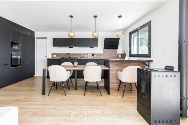 Maison contemporaine avec piscine et vue dégagée à Merville