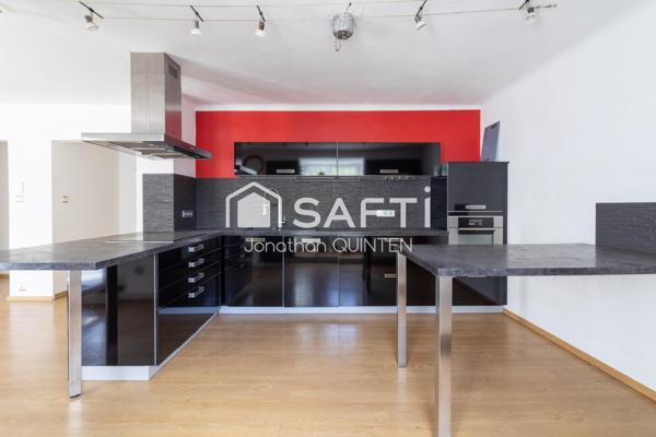 Un duplex avec de beaux volumes et un extérieur privatif, à proximité de la frontière allemande.