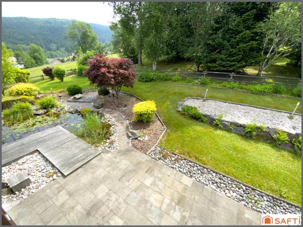 Chalet d'exception avec grand terrain paysagé de 2000 M2 ,  proximité des pistes et de la nature, emplacement rare.