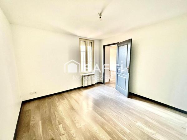 Maison de ville (2 beaux appartements;1 loué); terrasse.