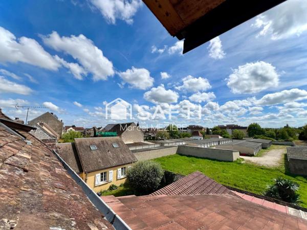 Maison de ville (2 beaux appartements;1 loué); terrasse.