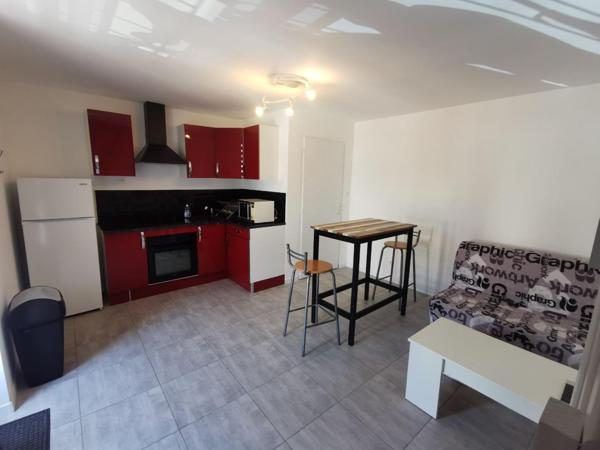 Immeuble 9 appartements , 14 garages et locaux commerciaux
