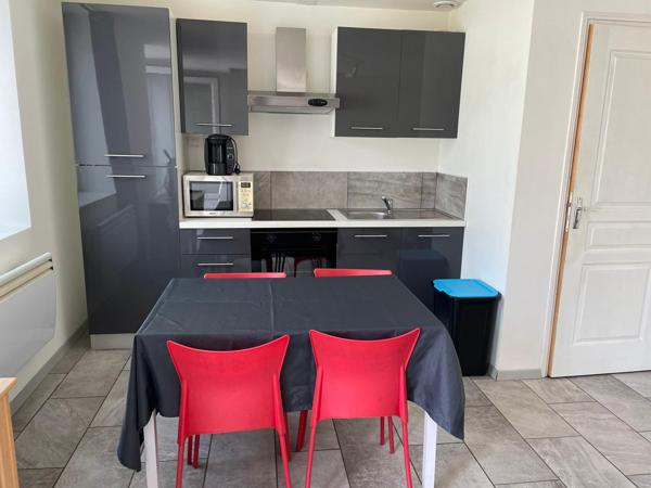 Immeuble 9 appartements , 14 garages et locaux commerciaux