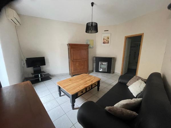 Immeuble 9 appartements , 14 garages et locaux commerciaux