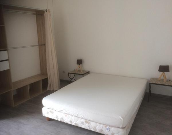 Immeuble 9 appartements , 14 garages et locaux commerciaux