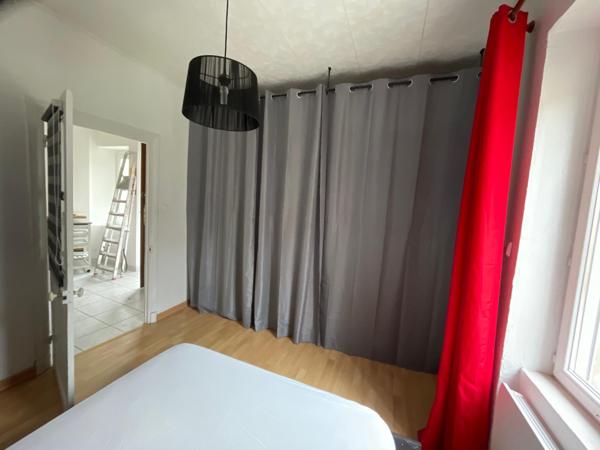 Immeuble 9 appartements , 14 garages et locaux commerciaux