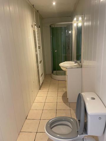 Immeuble 9 appartements , 14 garages et locaux commerciaux
