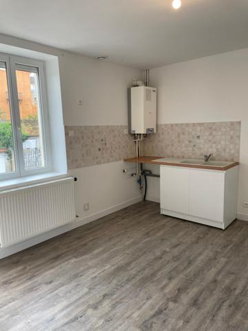 Immeuble 9 appartements , 14 garages et locaux commerciaux