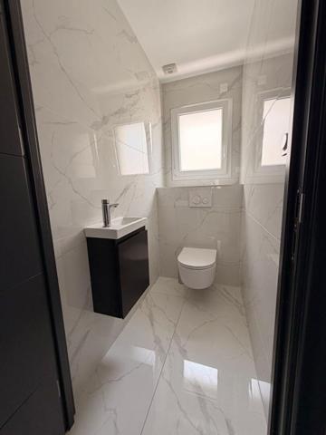 EXCLUSIVITÉ  Élégante villa contemporaine de plain-pied aux prestations premium