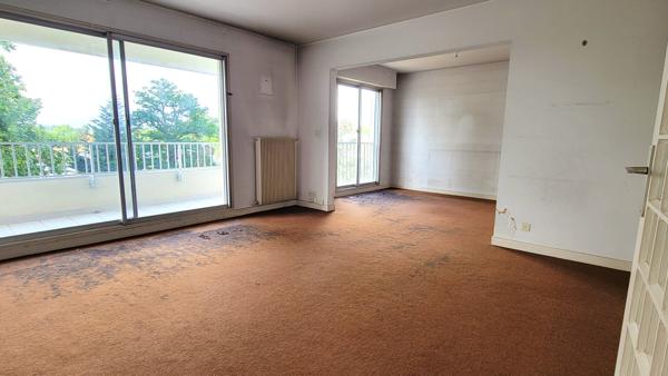 Appartement 4 pièces de 88 m2 avec balcons et box