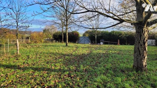 RIGNY, terrain non constructible à usage de verger.