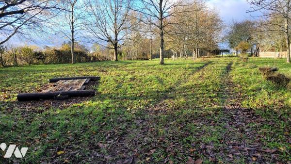 RIGNY, terrain non constructible à usage de verger.