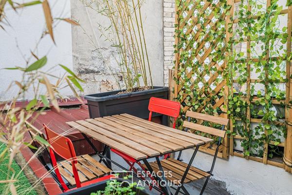 Appartement atypique avec terrasses sur cour