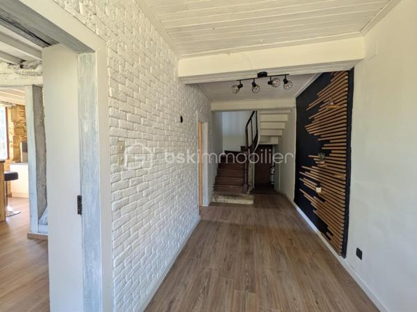 Avec une  rénovation déjà engagée, à finaliser selon vos envies, découvrez ce bien situé à seulement 10 minutes de Mirande et 25 minutes d'Auch.
Cette maison du début du XIXe siècle a déjà fait l’objet d’un début de rénovation, laissant aujourd’hui la possibilité aux futurs acquéreurs de terminer le projet à leur goût.

Elle développe environ 150 m² habitables et conserve de nombreux éléments de caractère : pierre apparente, poutres, cheminées et des volumes intéressants. Les murs en pierre de près de 60 cm d'épaisseur apportent tout le cachet et l'inertie thermique recherchés dans les maisons anciennes.

Au rez-de-chaussée : Un hall d'entrée, une grande pièce de vie avec cuisine ouverte, un salon avec cheminée, des WC séparés et un garage carrelé.
À l’étage : Trois chambres, une salle d'eau et un espace complémentaire à repenser.

EXTERIEURS ET DEPENDANCES :

Parcelle de 930 m² organisée autour de la maison, avec jardin en façade et sur le côté, un hangar (+80 m2), et 3 petits espaces de rangement extérieurs


INFORMATIONS TECHNIQUES :

- Toiture remaniée
- Combles isolés
- Fibre installée
- Panneaux rayonnants électriques avec programmateurs neufs
- DPE D


TRAVAUX A PRÉVOIR :

- Remplacement des menuiseries (simple vitrage)
- Assainissement individuel (non conforme)
- Mise à niveau de l'installation électrique
- Finitions




MAISON IDEALE POUR :

- Un projet de résidence principale personnalisée
- Un projet de rénovation
- Les amoureux de l’ancien
- Primo-accédants


LE PLUS : 

Une base déjà partiellement rénovée qui permet de se projeter tout en gardant la liberté d’aménager selon ses envies.
Taxe foncière de 914 € seulement !

📞 Une visite s’impose pour en apprécier tout le potentiel ! Contactez Christel Sonet-Pambrun au 06.10.85.50.94     (Visite virtuelle sur demande)