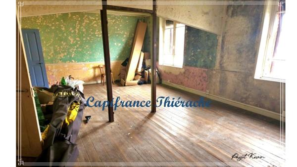 Immeuble composé d'une habitation et d'un commerce bar