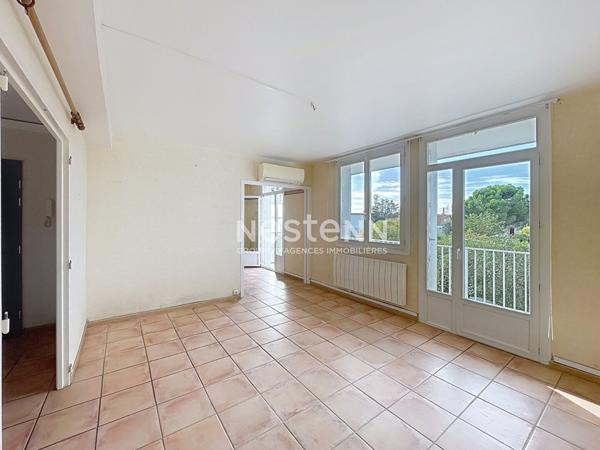 Appartement 4 pièces à Nîmes, balcon, loggia, parking et cave