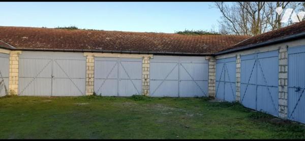 Ensemble de 11 garages loués sur la commune de SAINTES - Quartier Gare