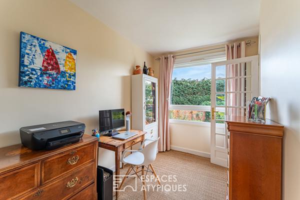 Lumineux premier étage avec balcon sur espace vert