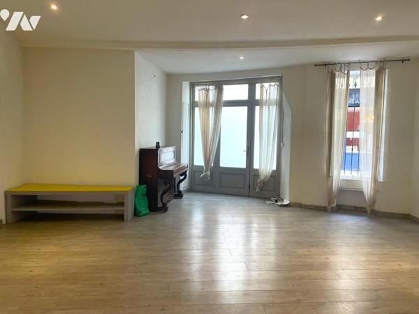 Appartement rez-de-chaussée climatisé avec cour intérieure et cave