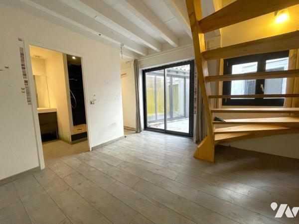 Appartement rez-de-chaussée climatisé avec cour intérieure et cave